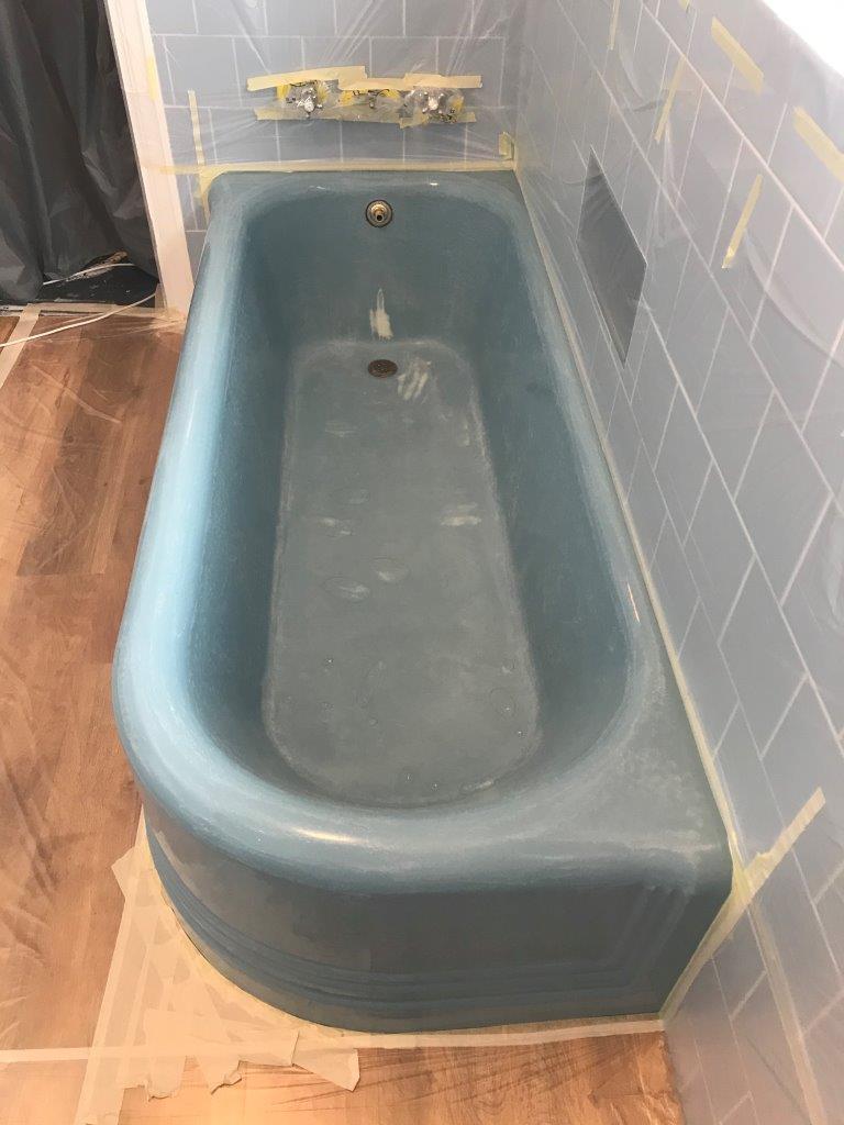 Blue enamel bath before resurfacing