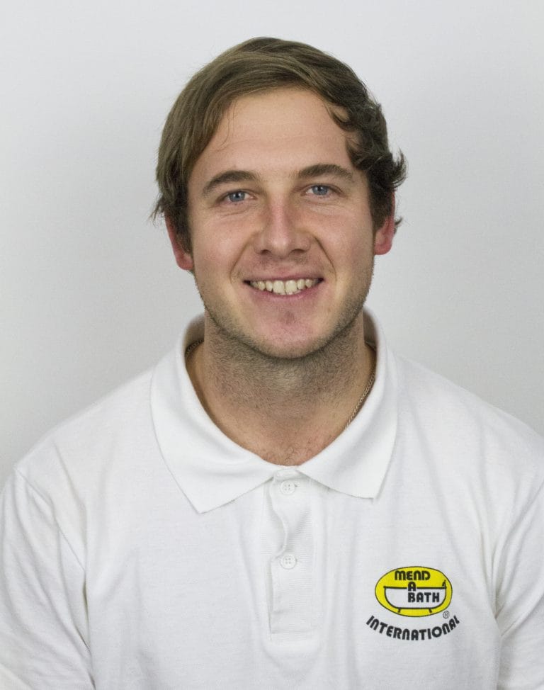 Cecil, a Mendabath technician, in company uniform