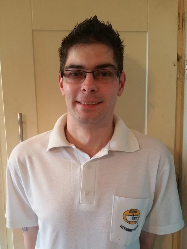 A Mendabath technician in company uniform